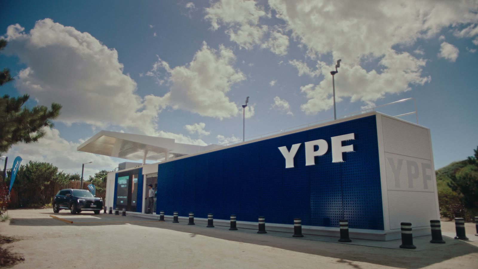 The YPF station under a summer sky